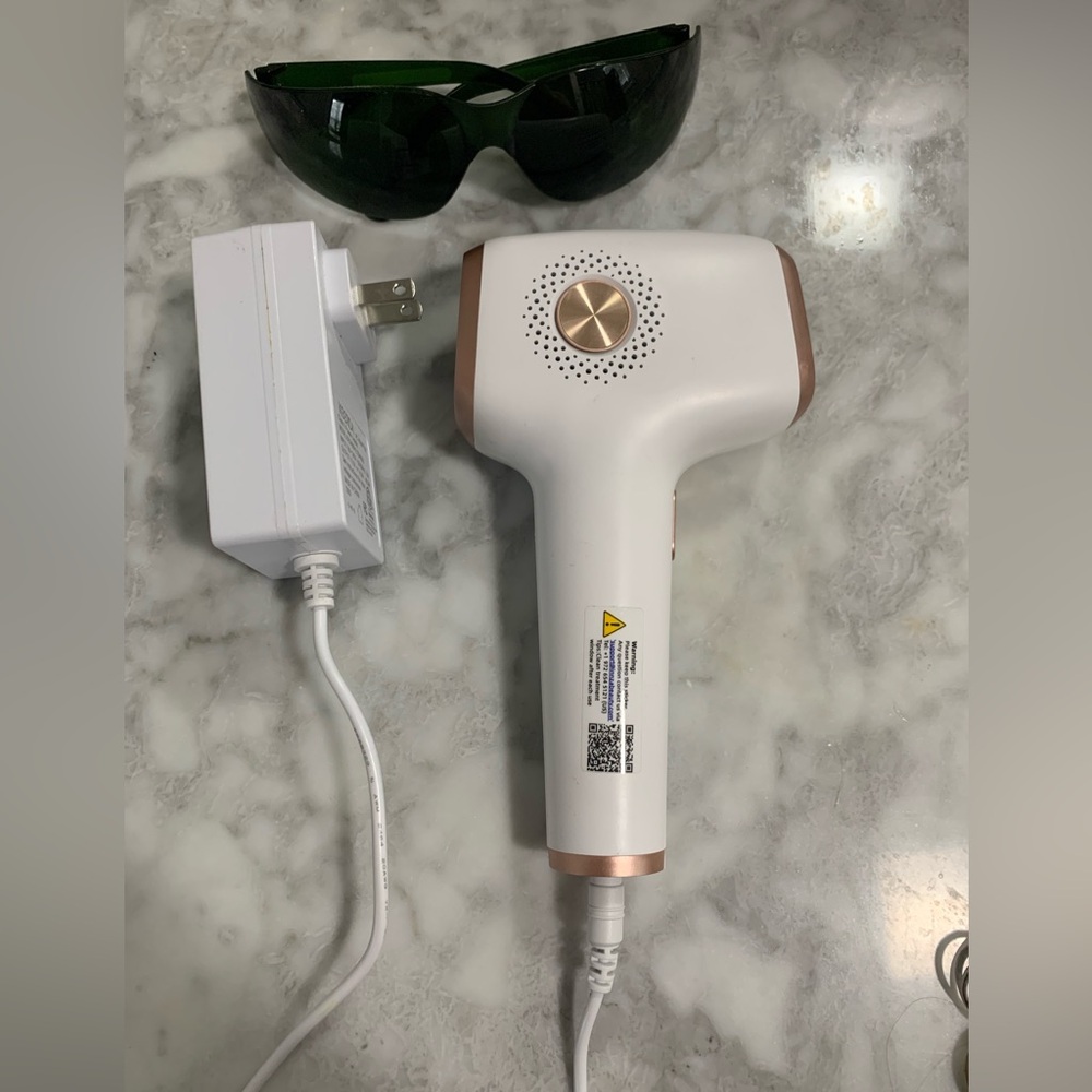 White and Gold Hair Removal Device